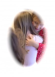 2 girls hugging.white oval. face edited